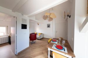 Appartements Les Trois Eveches : photos des chambres