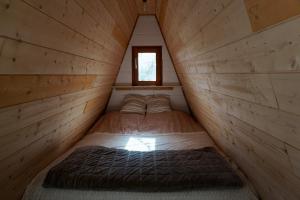 Chalets Le Chalet Tipi avec jacuzzi et jardin : photos des chambres