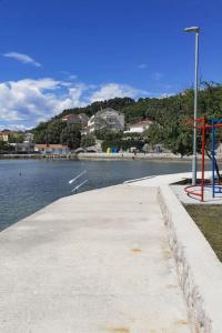 Apartments by the sea Kampor, Rab - 11407 