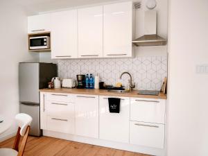 Apartment in Dziwnów by the River & Beach