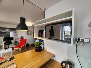 Appartements Le Seattle - Studio cosy avec wifi : photos des chambres