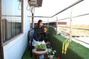 Perfectstayz Premium Ganga Heights - Ganga View rooftop cafe