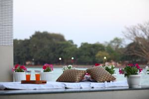 Perfectstayz Premium Ganga Heights - Ganga View rooftop cafe