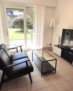 Appartements Ty Cocoon- Appartement avec terrasse et parking prive : photos des chambres