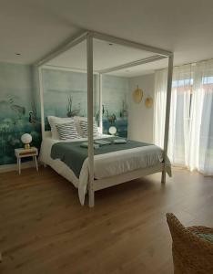 Villas La Maison Tchanquee jusqu'a 12 personnes Jacuzzi prive : photos des chambres