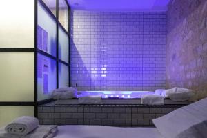 Appartements Jacuzzi & Hammam de luxe au pied du Chateau : photos des chambres