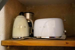 Appartements Les pieds dans le Chateau - Jacuzzi : photos des chambres