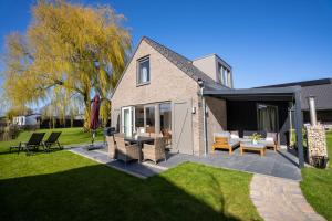 Meertje Villa 81 op Recreatiepark De Wielen - 4hvězdičkové hotely ve městě Sint Maarten