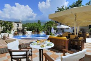 Triple Room with Pool View room in Enalion Hotel