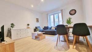 Appartements L'Alcove - havre de paix - chic et confortable : photos des chambres