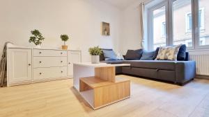 Appartements L'Alcove - havre de paix - chic et confortable : photos des chambres