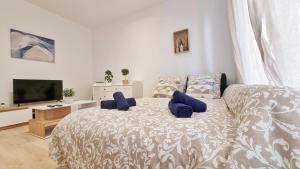 Appartements L'Alcove - havre de paix - chic et confortable : photos des chambres