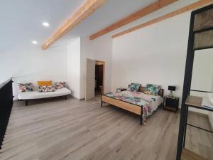 Appartements Superbe appartement avec jacuzzi et jardin prives : photos des chambres