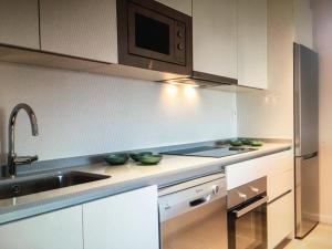 central bright apartment, community pool and own private pool on splendid terrace, garage, beach 900m, mountains 200m