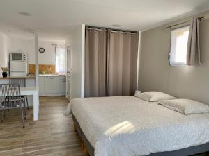 Appartements Joli Studio cosy en Corse : photos des chambres