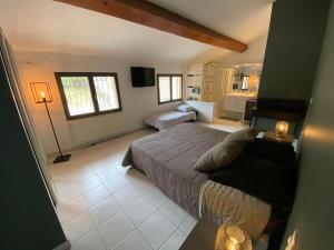 Villas Maison de famille (piscine, jacuzzi et sauna) : photos des chambres