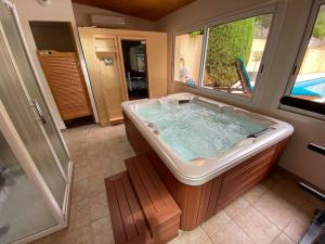 Villas Maison de famille (piscine, jacuzzi et sauna) : photos des chambres