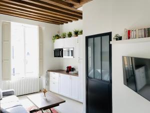 Appartements Confortable studio dans un immeuble de charme : photos des chambres