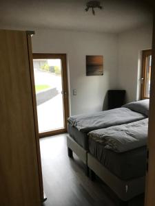 Ferienwohnung Wein unter Palmen