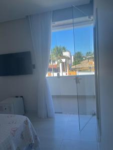 Casa 4 suítes com piscina Condomínio Lagoa Dourada Ilha de Itaparica BA