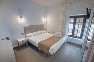 Quadruple Room room in Hostal Esencia de Azahar