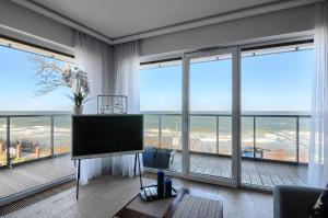Apartament Szafirowy z BEZPOŚREDNIM WIDOKIEM na morze- Nadmorski Luksus Apartamenty