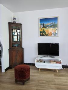 Maisons de vacances Au chalet d'Illiers Combray, grand jardin arbore : photos des chambres