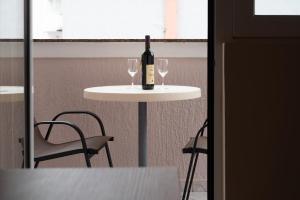 Twin Room with Balcony room in Garni Hotel MB