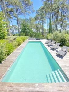 Villas Biscarrosse Hautes Rives Villa avec piscine vue lac pour 12 personnes : Maison 4 Chambres