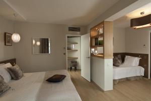 Hotels Hotel des Lices : photos des chambres