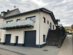 Ferienwohnung Wein unter Palmen