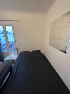 Appartements cosy apartment - 15 min from paris : photos des chambres