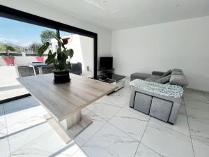 Appartements Bora-Bora T4 Neuf avec Terrasse : photos des chambres