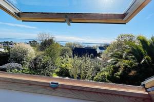 Maisons de vacances Les agapanthes - vue mer : photos des chambres