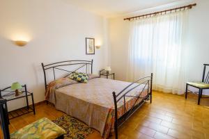 Appartements La Caletta Corsa Apartments con due camere a 100 m dal mare - WiFi fibra FTTH - ALL INCLUSIVE : photos des chambres