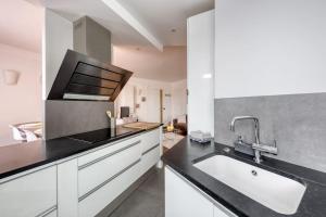 Appartements Le versaillais Gare/Chateau/Wifi/Netflix : photos des chambres