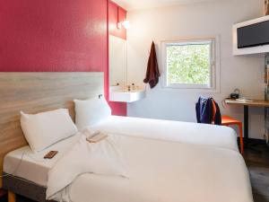 Hotels hotelF1 Lyon Solaize : photos des chambres