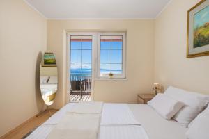 Apartment Barbara, sea view with terrace near Opatija 
