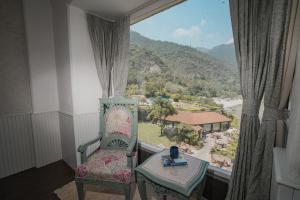 Aloha Ganga view 2BHK Apartment by Almost Heaven