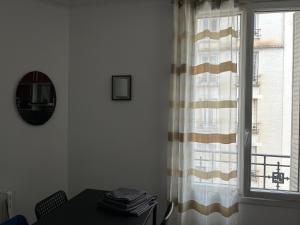 Appartements Belle journee a Vincennes : photos des chambres