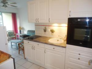 Appartements Appartement 2 pieces climatise, 300m plages, piscine : photos des chambres