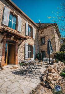 Maisons de vacances Maison de village avec piscine : photos des chambres