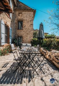 Maisons de vacances Maison de village avec piscine : photos des chambres