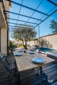 Maisons de vacances Maison de village avec piscine : photos des chambres