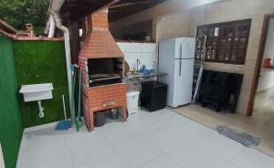 Casa Condomínio Bertioga - 800mt da Praia - Com AR Condicionado