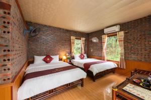 Phòng Có Giường Cỡ Queen Nhìn Ra Vườn (Queen Room with Garden View)