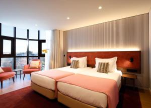 Family Room (2 Adults + 2 Children) room in Montebelo Viseu Congress Hotel