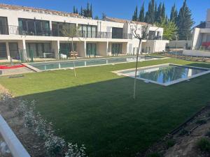 Appartements Les Papillons du Ventoux - Le Souci - eenslaapkamerappartement met terras en tuin : photos des chambres