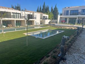 Appartements Les Papillons du Ventoux - Le Souci - eenslaapkamerappartement met terras en tuin : photos des chambres