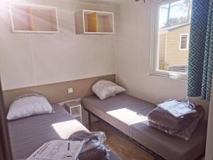 Appartements Mobil home Premium Camping 5* : photos des chambres